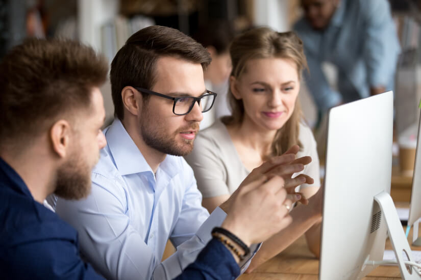 People looking at computer