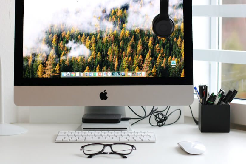 iMac with mouse and keyboard