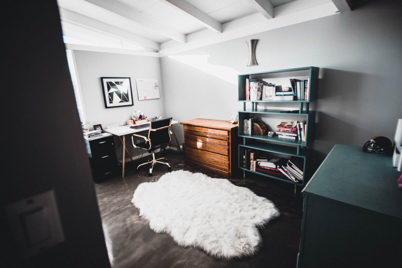 White floor rug in home office